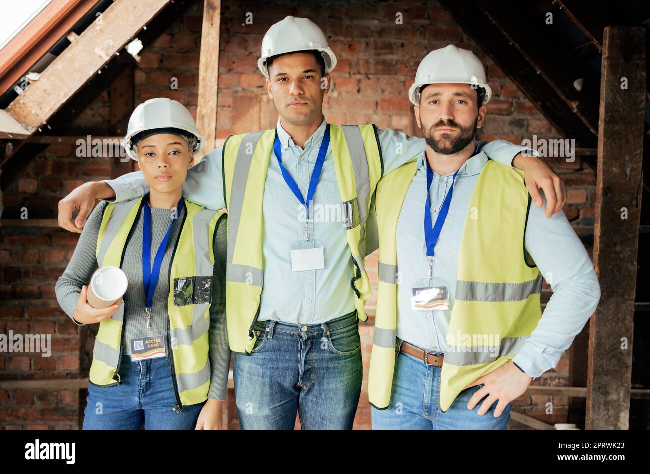 Construction workers, men and woman in teamwork collaboration with