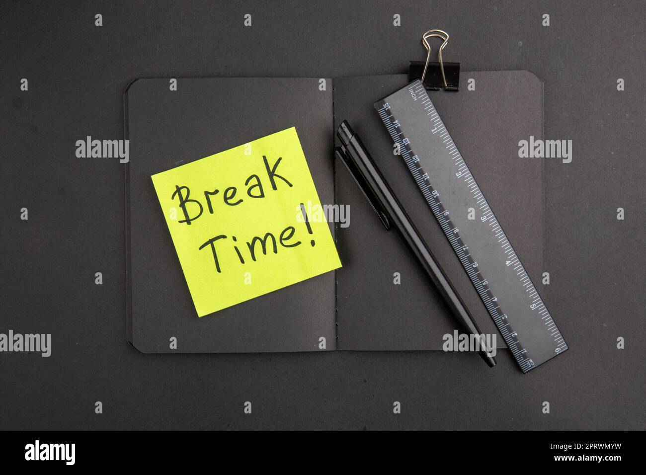 top view black notepad break time written on note paper ruler pen