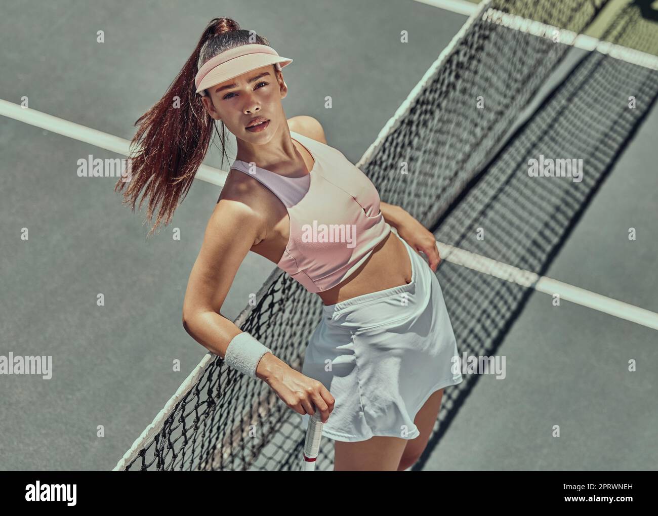 Tennis court, fashion and sports woman, portrait for fitness, exercise and training motivation for a healthy lifestyle. Aesthetic model outdoor for te Stock Photo