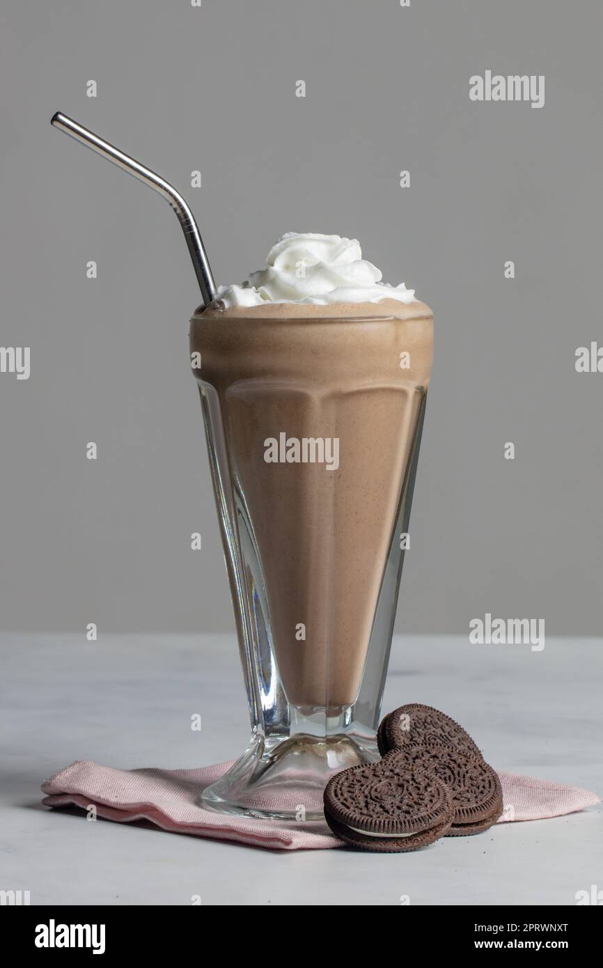 Vegan shake made with oat milk ice cream and coconut whipped cream