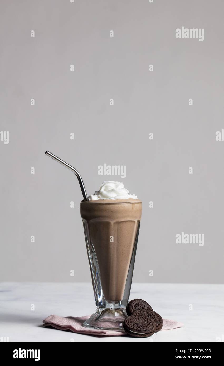 Vegan shake made with oat milk ice cream and coconut whipped cream