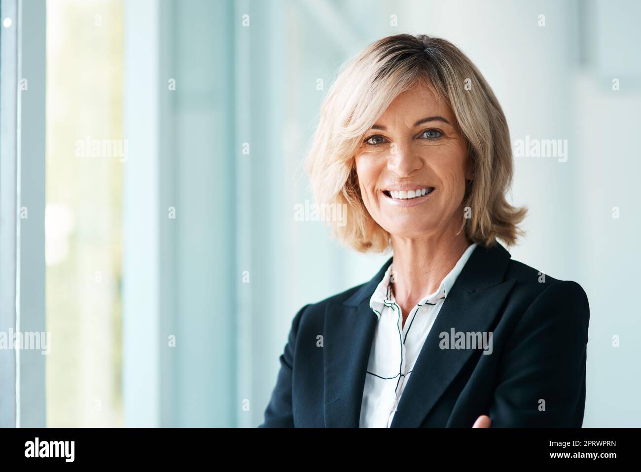 A session with me could get you back on track. Portrait of a confident mature psychologist working in a modern office. Stock Photo