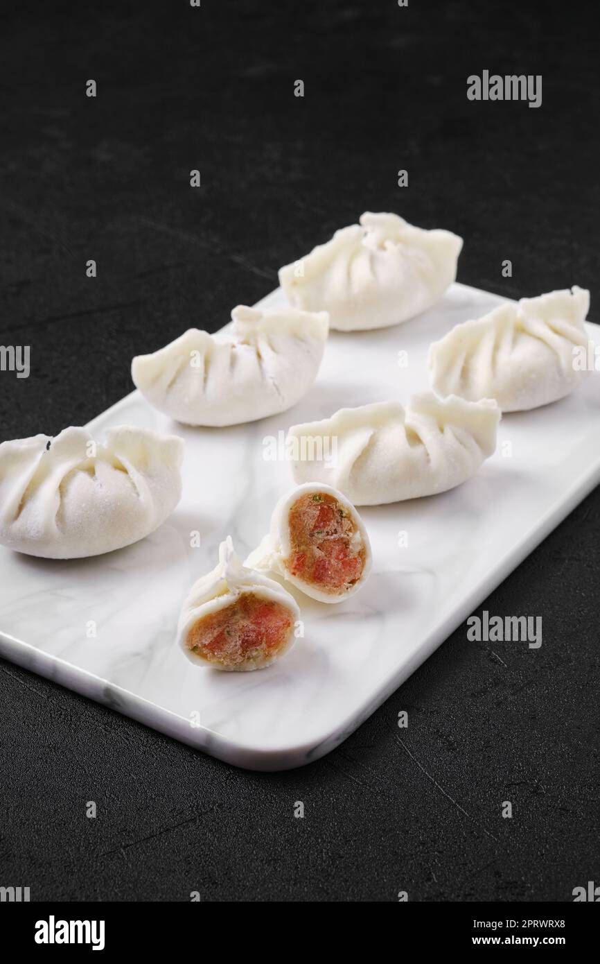 Frozen dumplings stuffed with liver and provencal herbs Stock Photo Alamy