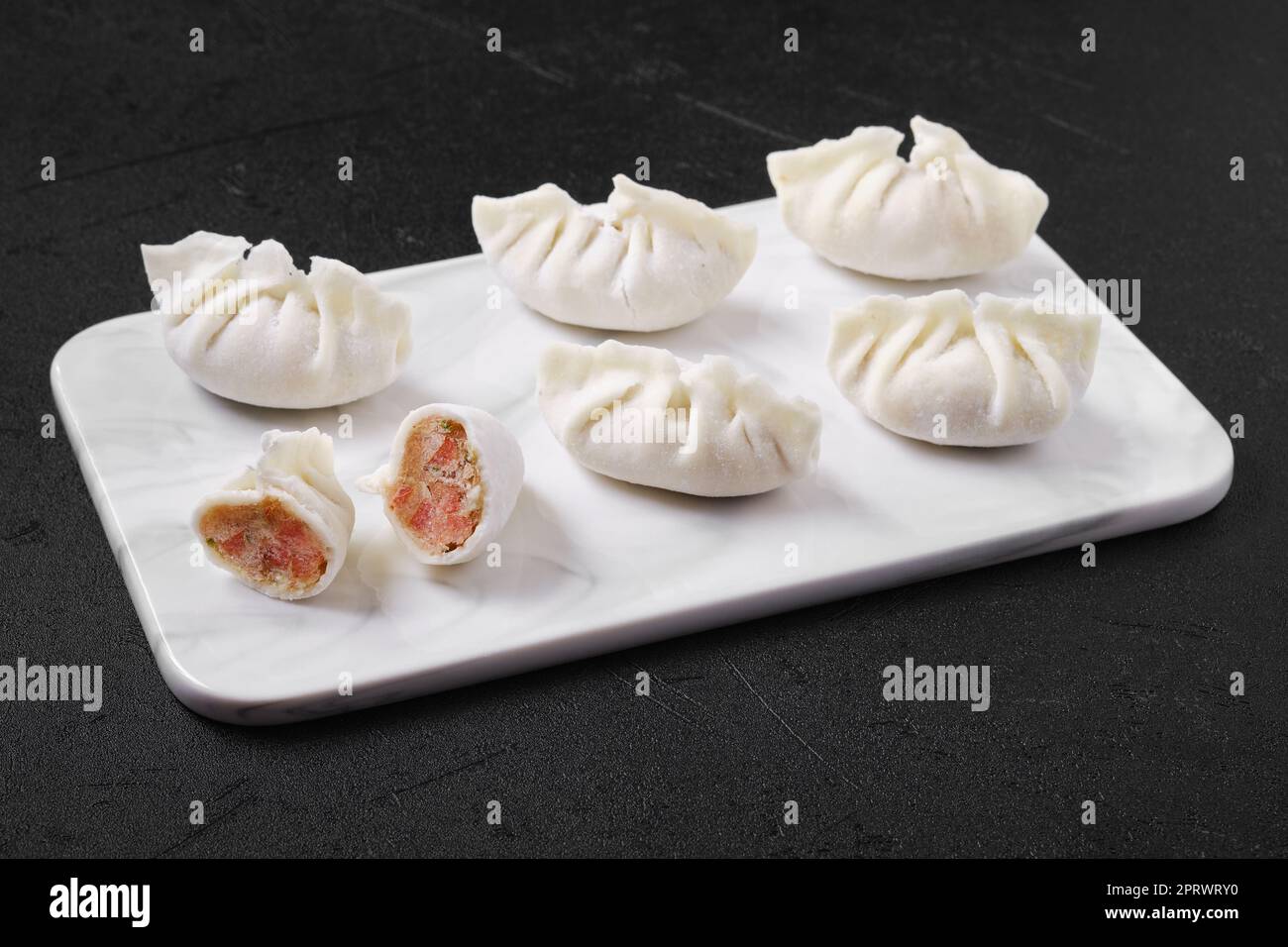Frozen dumplings stuffed with liver and provencal herbs Stock Photo Alamy