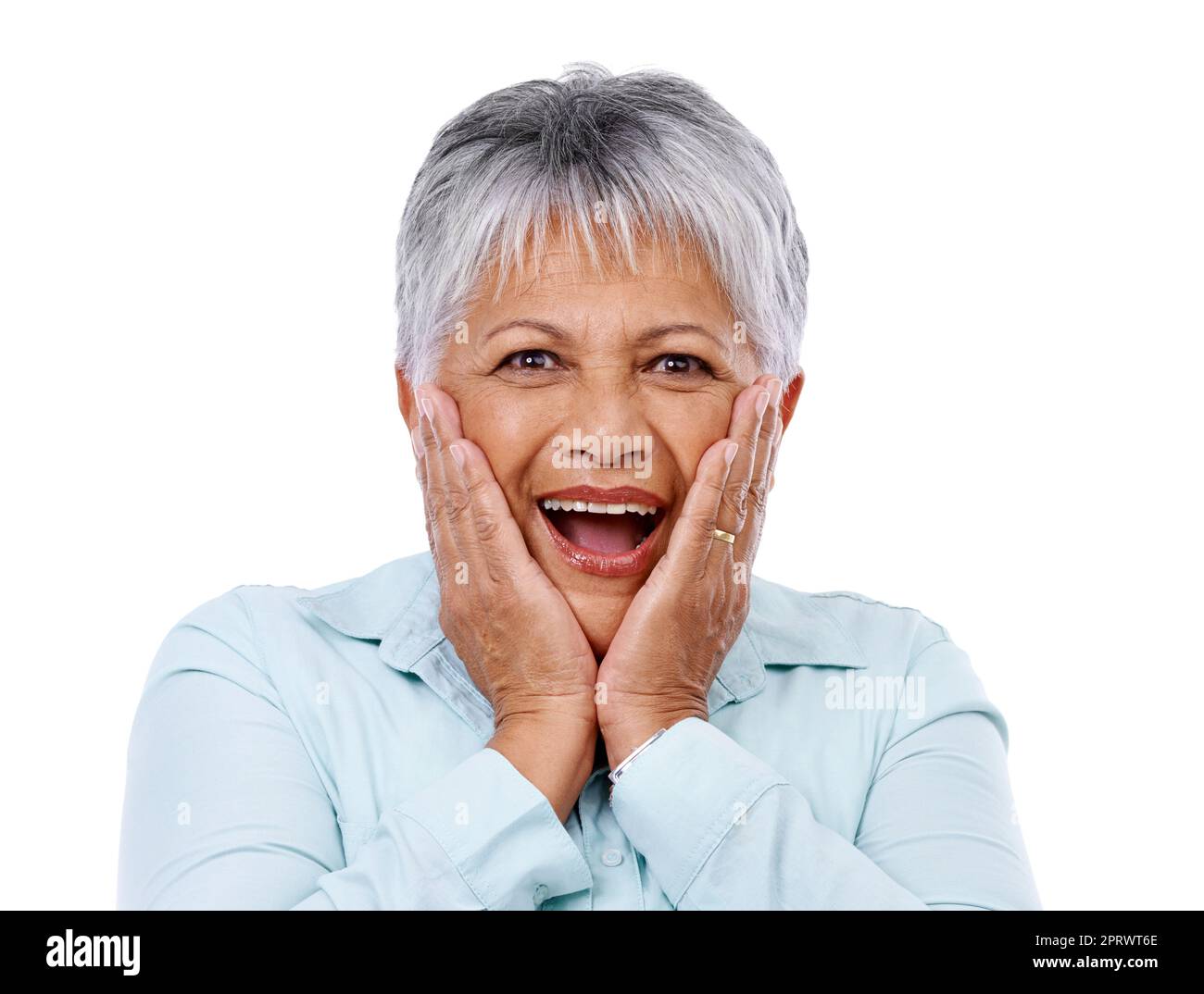 Say what. Studio shot of a surprised-looking mature woman isolated on white. Stock Photo