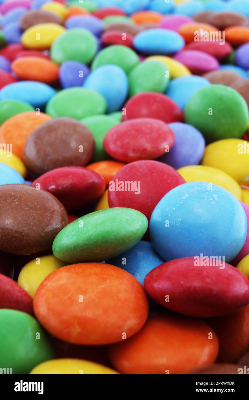 Multi coloured halloween candy sweets background with differential focus Stock Photo