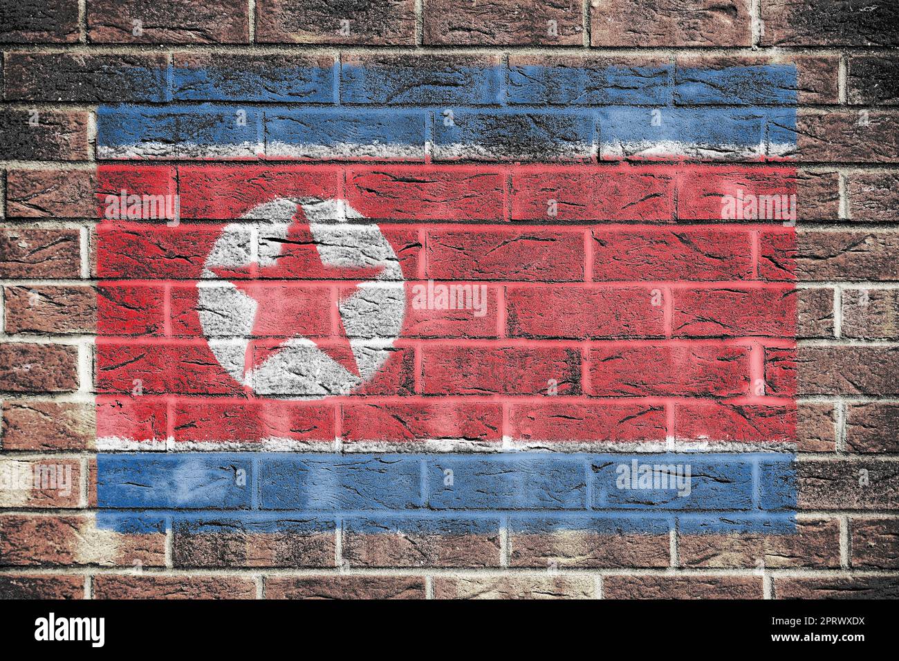 North Korea flag on old brick wall background Stock Photo