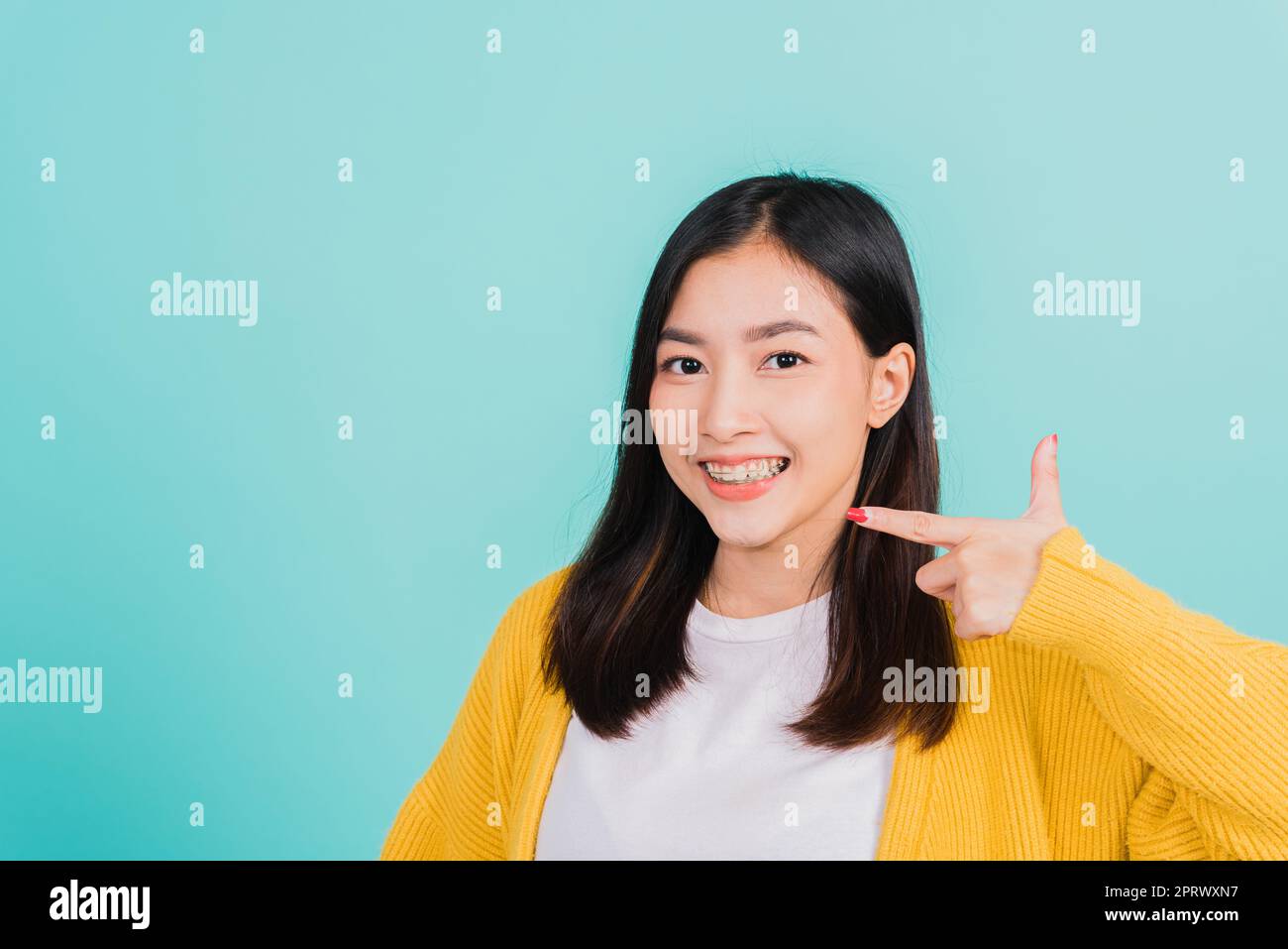 Finger at teeth hires stock photography and images Alamy