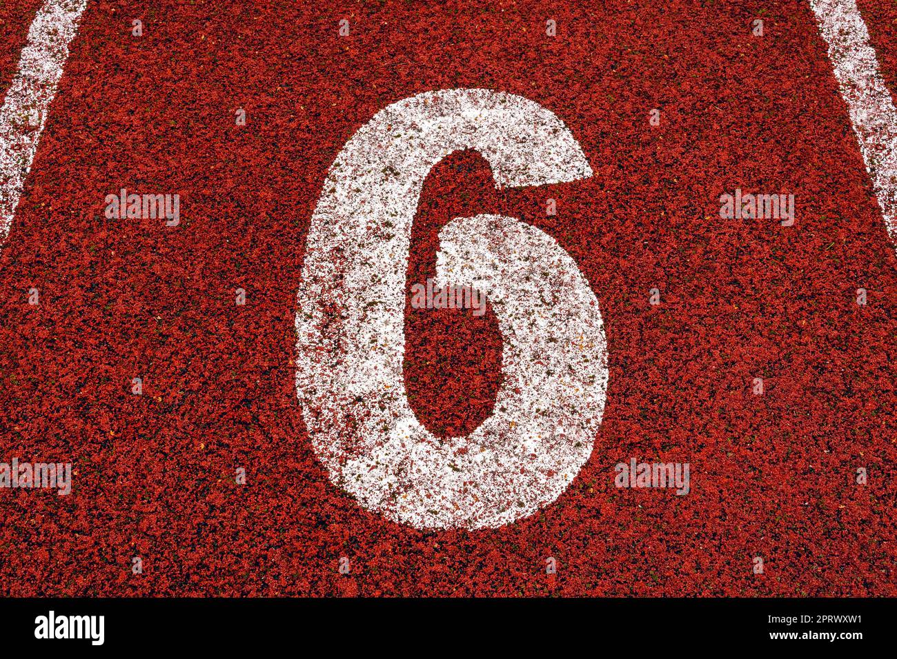 The number 6 at start point of running track or athlete track in stadium Stock Photo