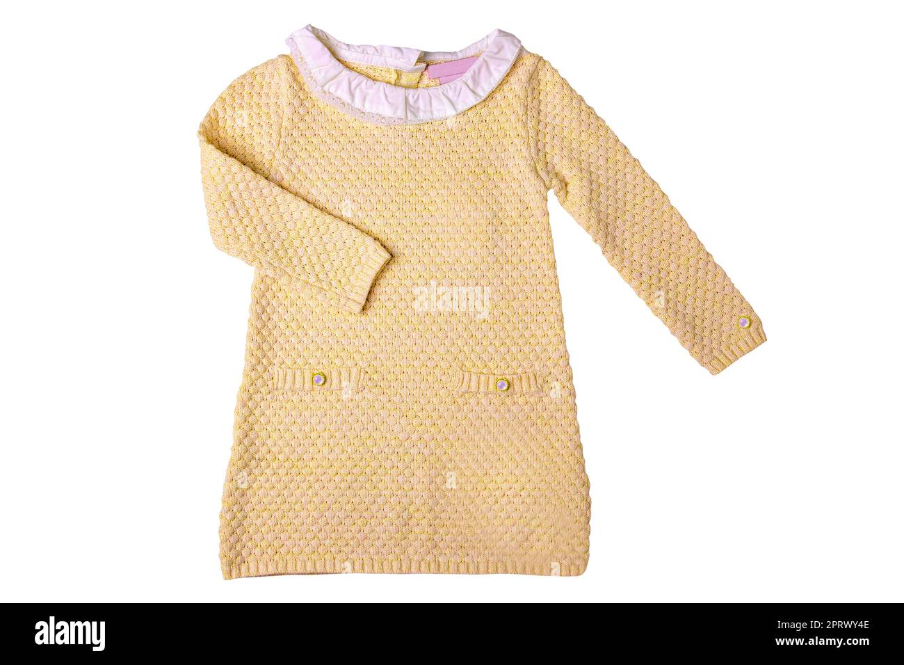 Clothes for children. A beautiful yellow baby girl dress with white lace collar and long sleeves isolated on a white background. Clipping path. Kids autumn and spring fashion. Stock Photo