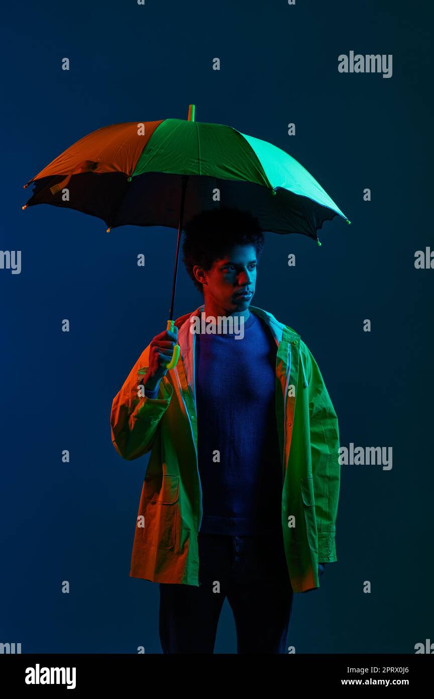 Boy wearing raincoat hi-res stock photography and images - Alamy