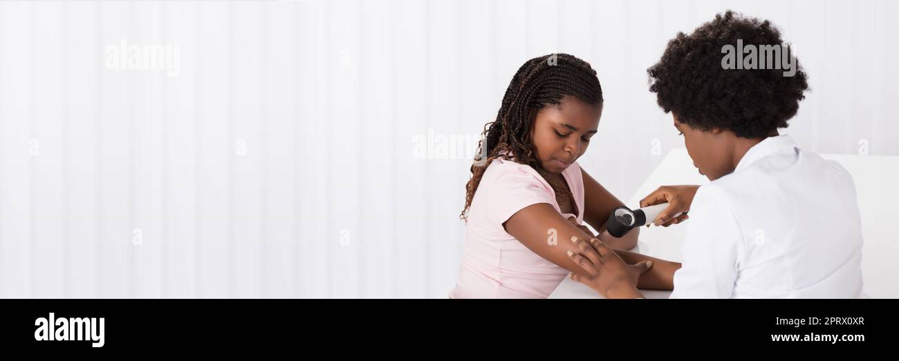 African American Dermatology Consultation. Doctor Checking Child Skin