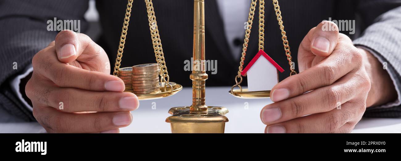 Balance scales with coins hi-res stock photography and images - Alamy