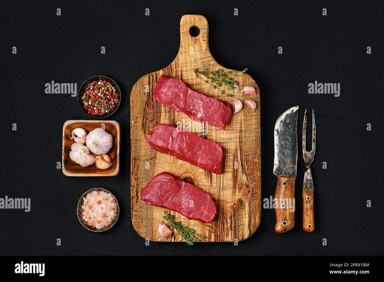 Overhead view of raw boneless strip steak loin Stock Photo Alamy