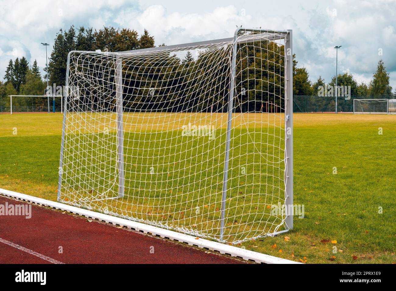 Small goal on a football field Stock Photo