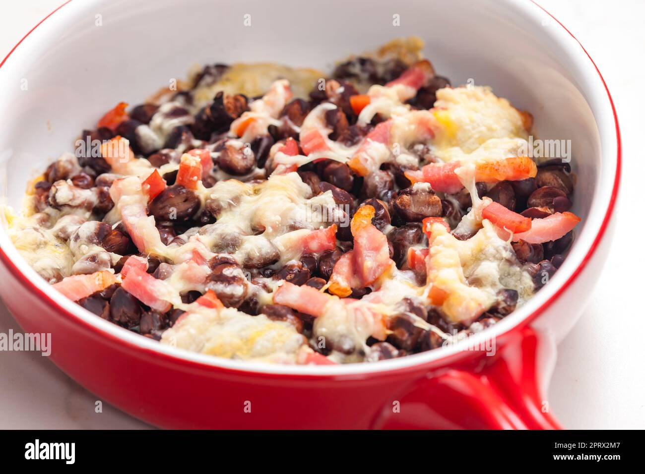 beans baked with bacon and cheese Stock Photo Alamy