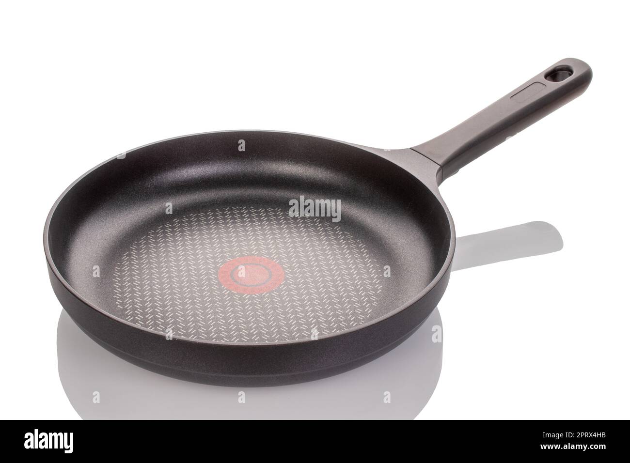 One metal frying pan, macro, isolated on white background Stock Photo -  Alamy