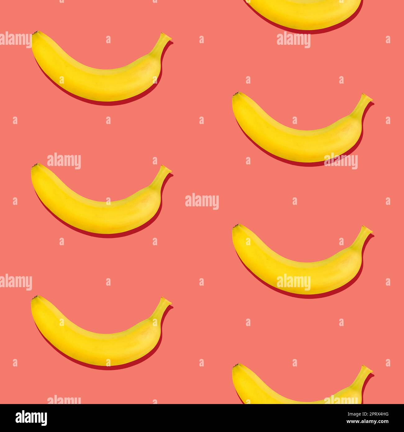 Seamless pattern of bananas on pink background Stock Photo