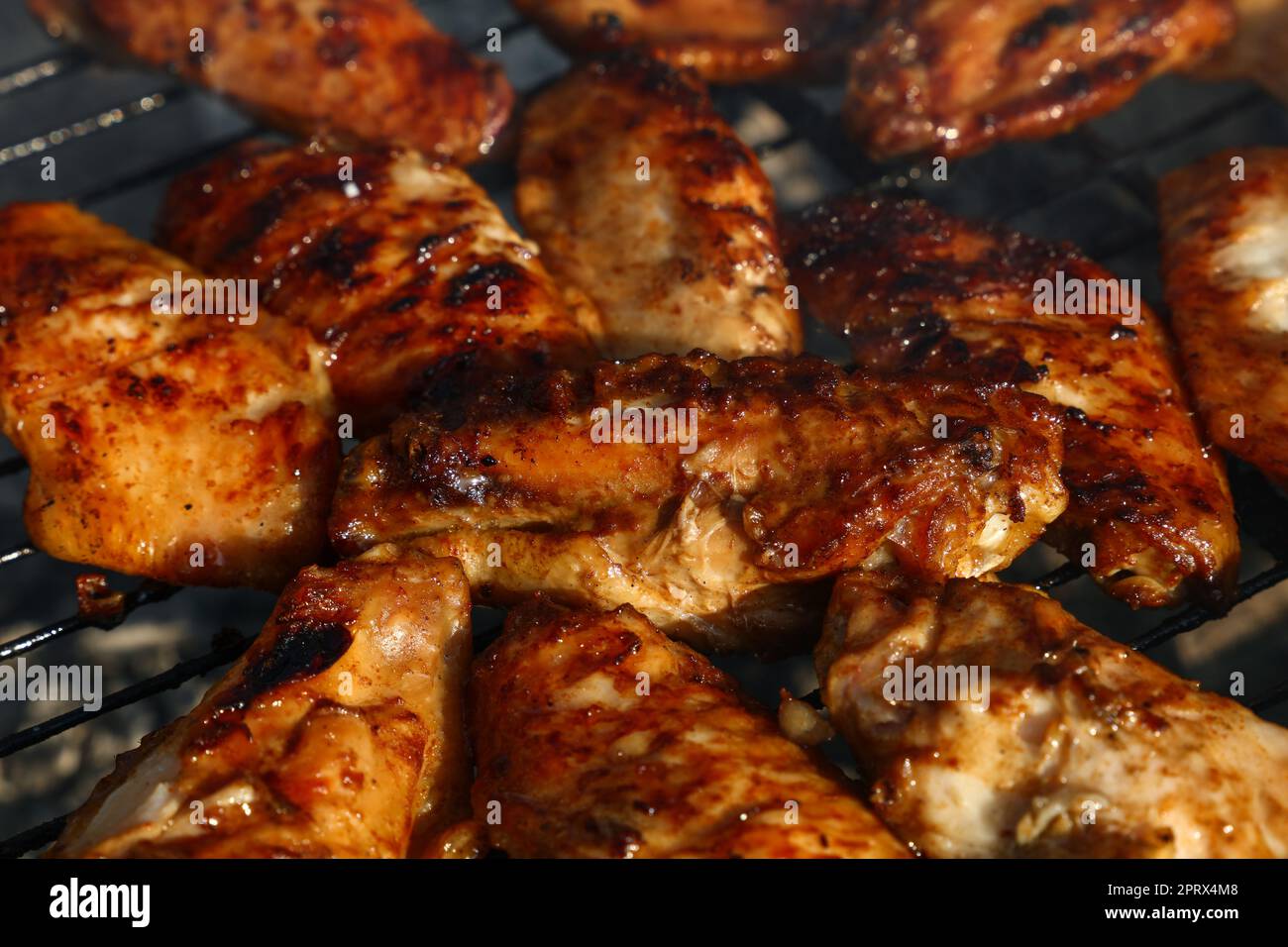 Chicken buffalo wings cooked on BBQ grill Stock Photo