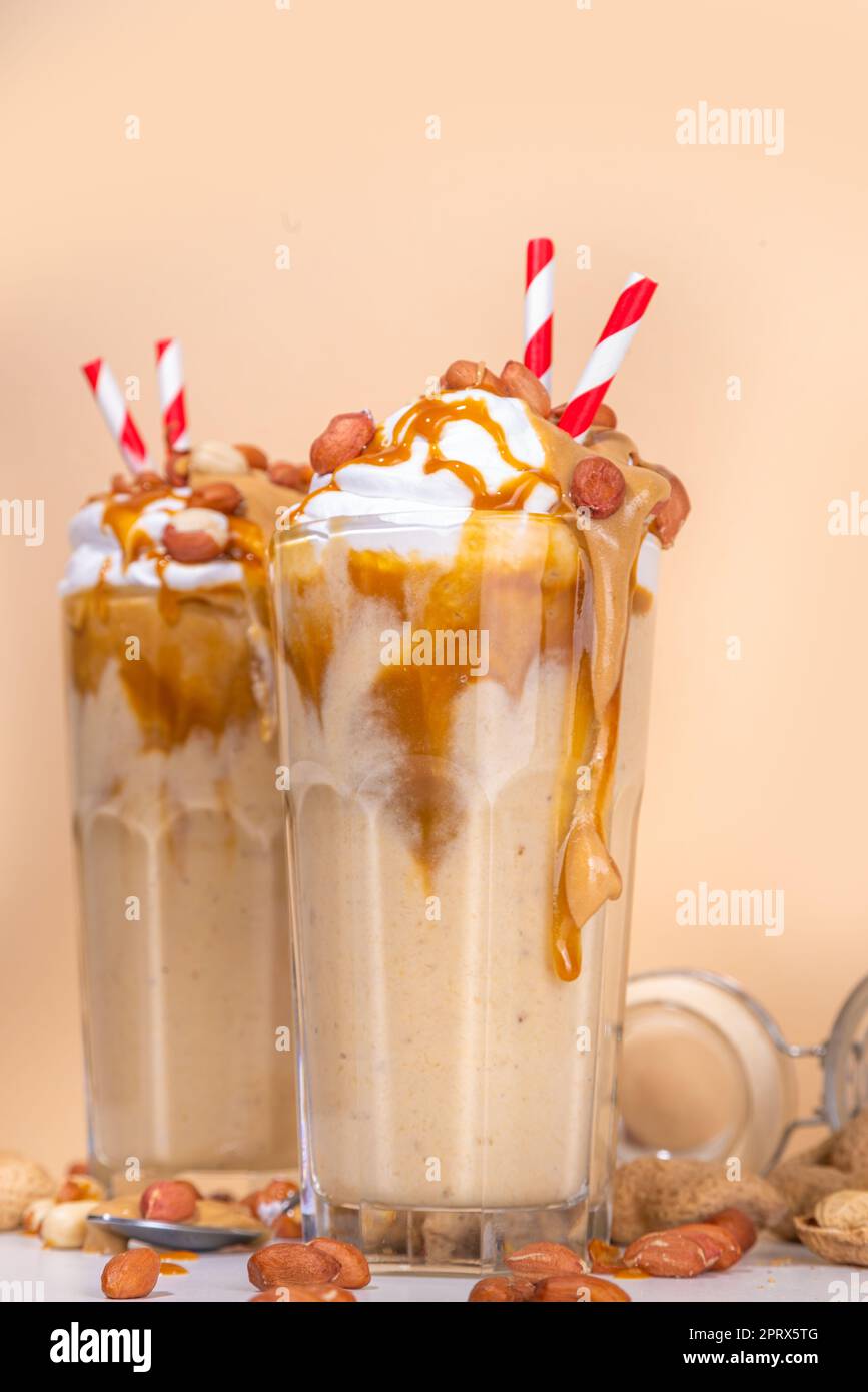 Peanut butter smoothie, milk shake with a lot of peanuts and caramel