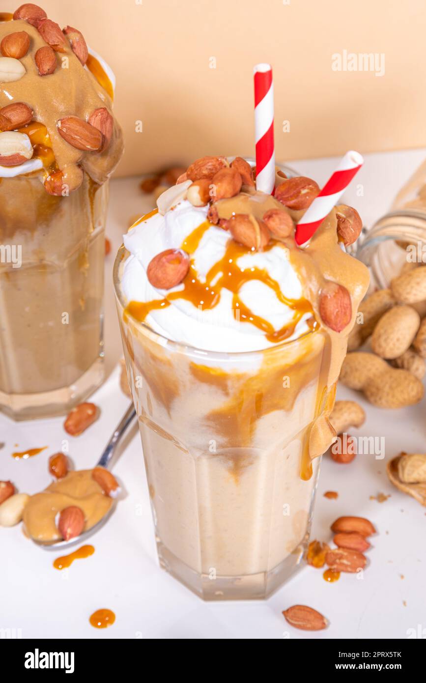 Peanut butter smoothie, milk shake with a lot of peanuts and caramel