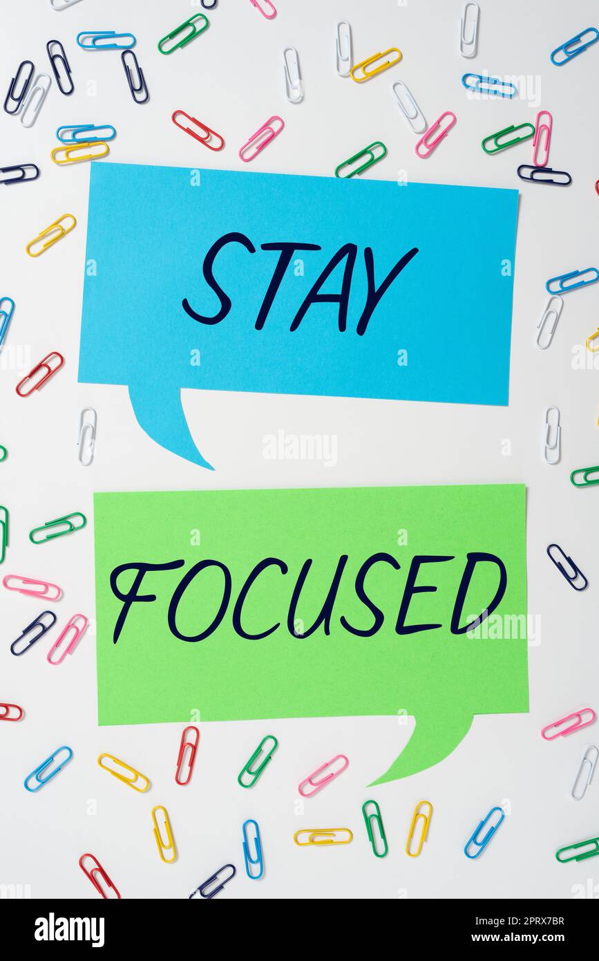 Hand writing sign Stay Focused, Word for Be attentive Concentrate ...