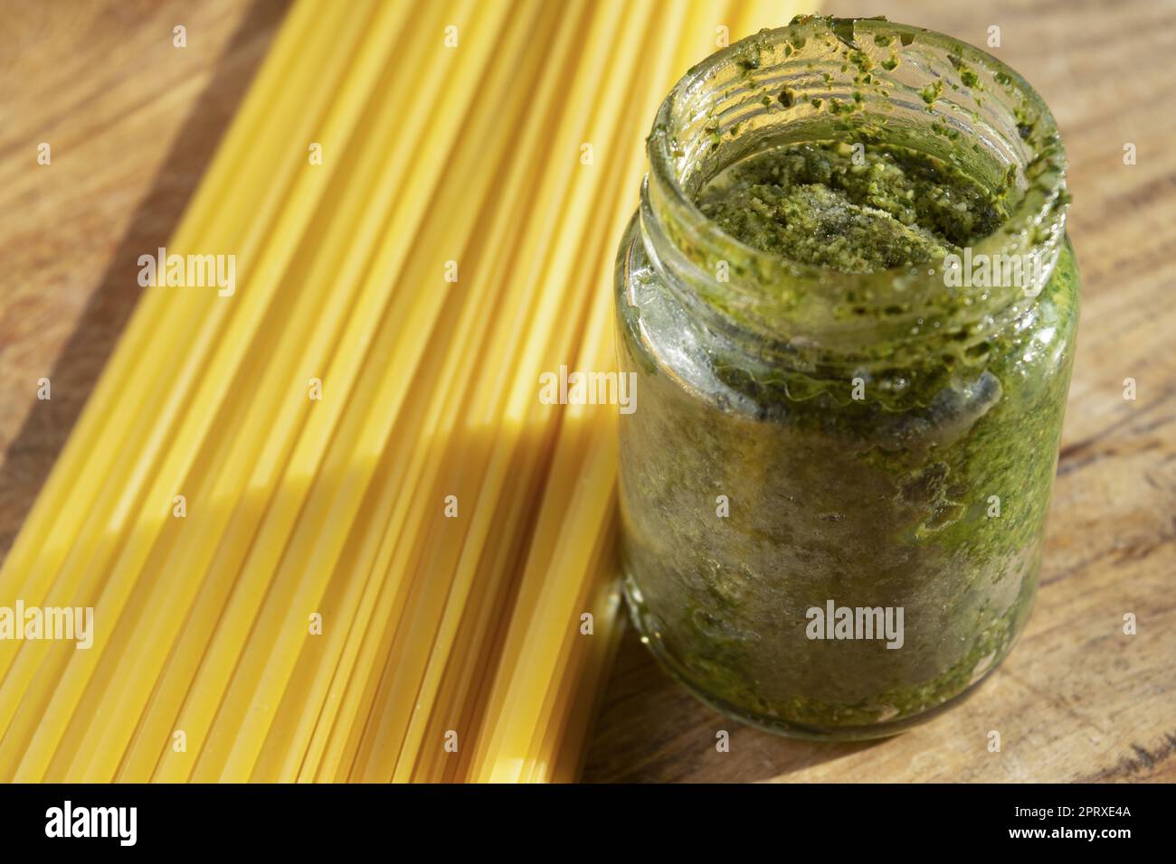 frozen homemade basil pesto with raw spaghetti Stock Photo Alamy