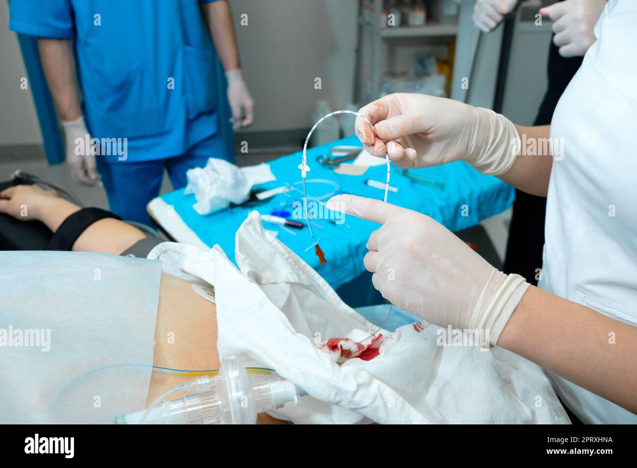 Epidural catheter in the hands of an anesthesiologist. Selective focus