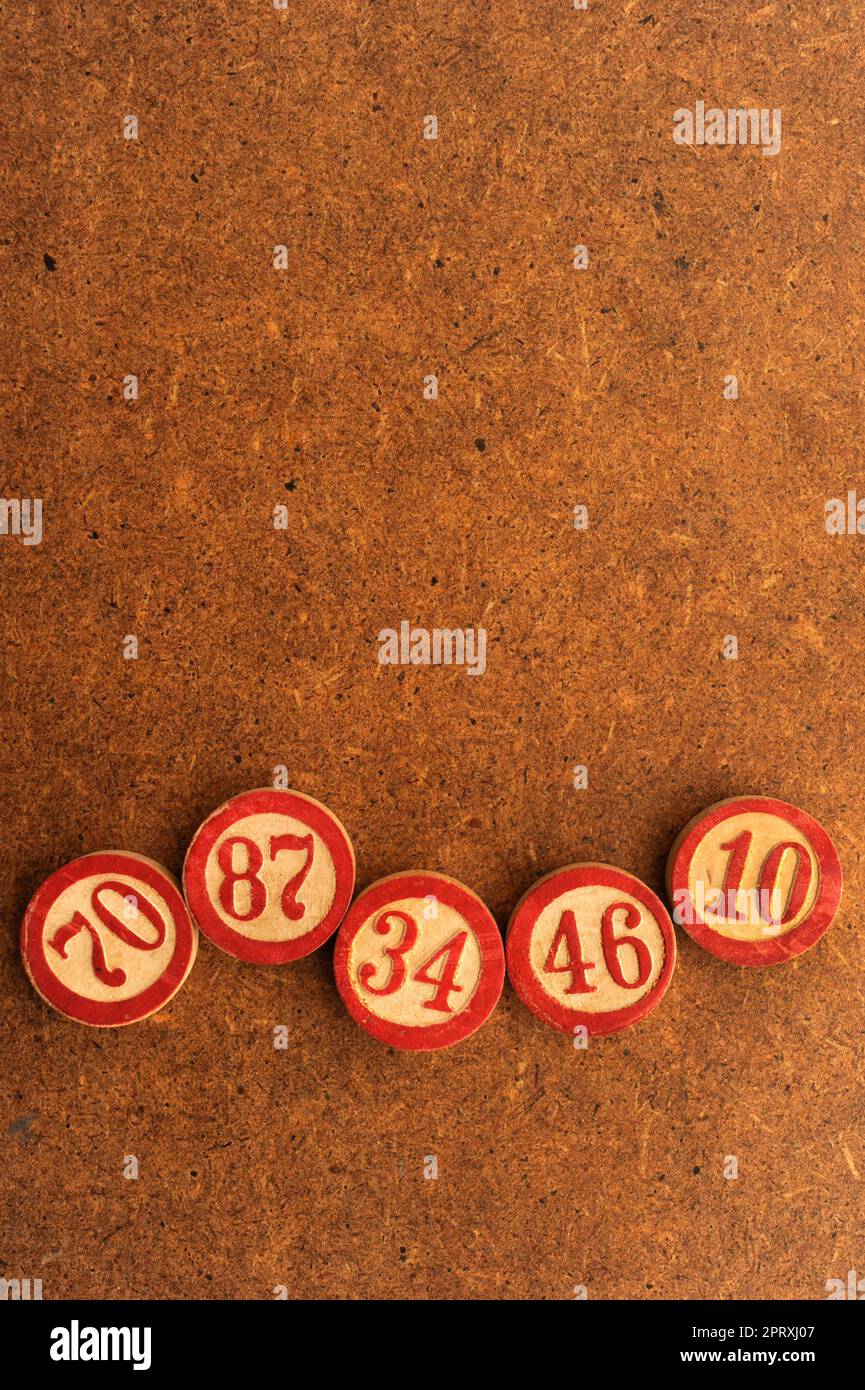 vintage wooden bingo markers Stock Photo - Alamy