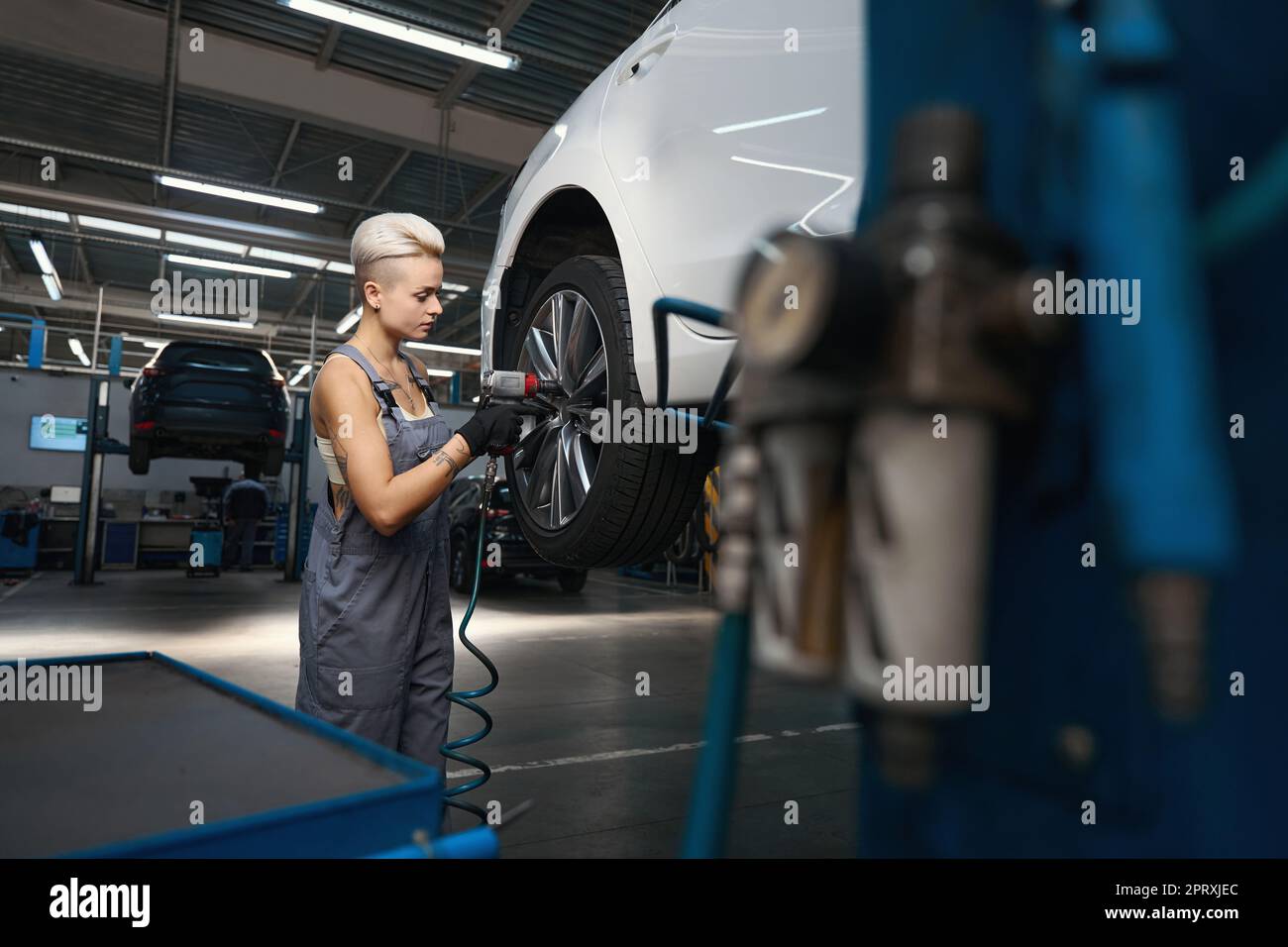 Car mechanic uses wrench repair hi-res stock photography and images - Alamy