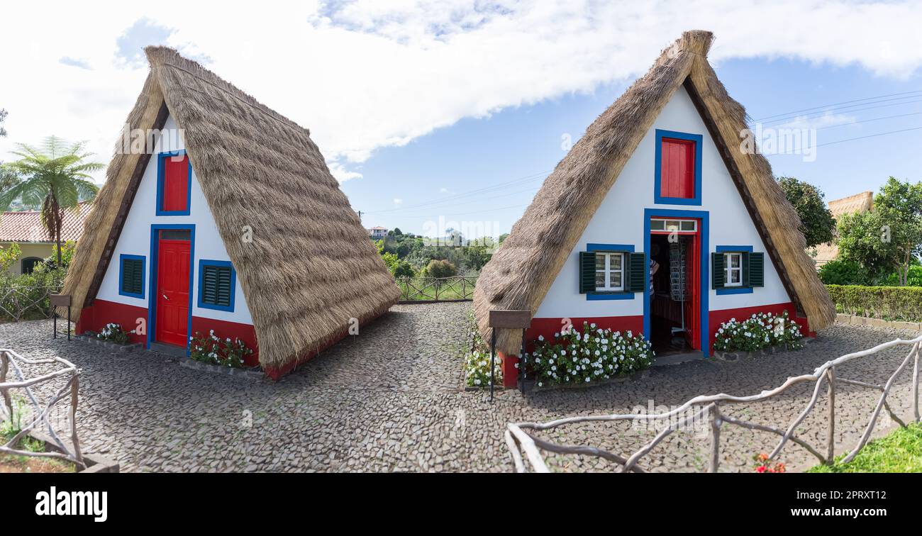 Madeira Island Portugal - 04 19 2023: Panoramic view of the typical and traditional house on the island of Madeira, a tourist icon in the village of S Stock Photo