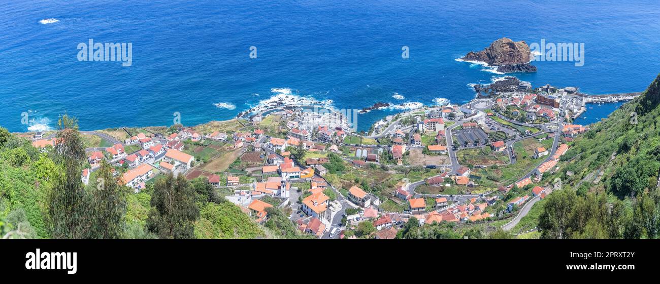 Madeira Island Portugal - 04 19 2023: Panoramic aerial view at the Porto Moniz village , full view at the main settlement of Porto Moniz and ilhéu Mol Stock Photo