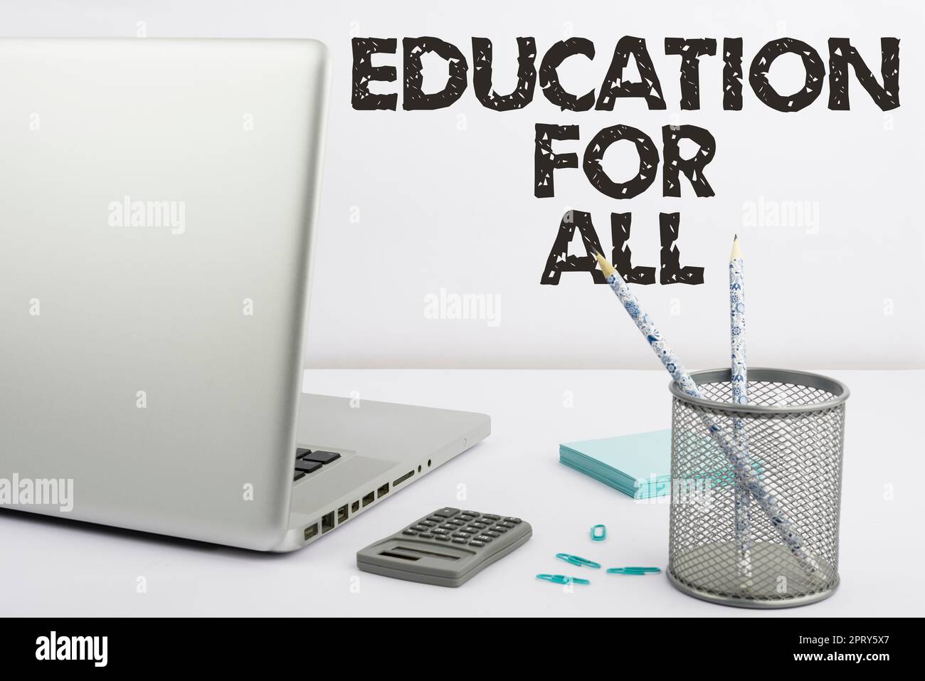 Text showing inspiration Education For All, Business approach Continue to Improve Your Skills and Empower your Boundaries Lap Top, Case With Pencils, Stock Photo