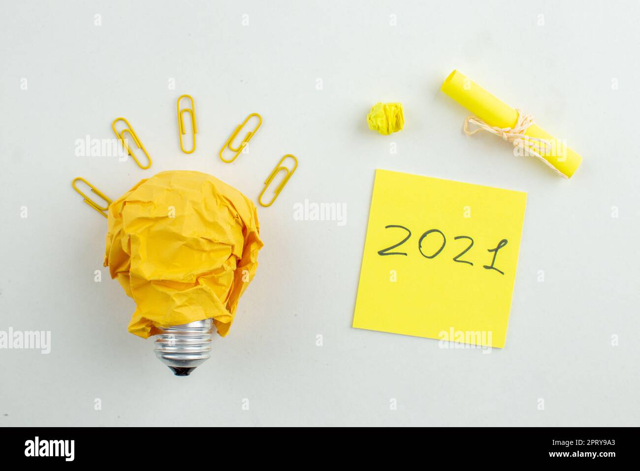 top view written on sticky notes idealight bulb on white isolated ...