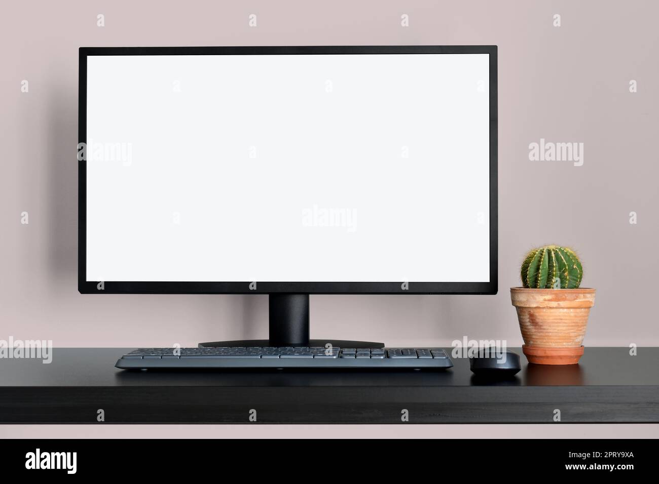 Modern pink office with empty computer desktop mockup for display your graphic design Stock Photo