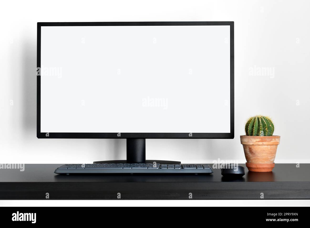 Modern white office with empty computer desktop mockup for display your graphic design Stock Photo