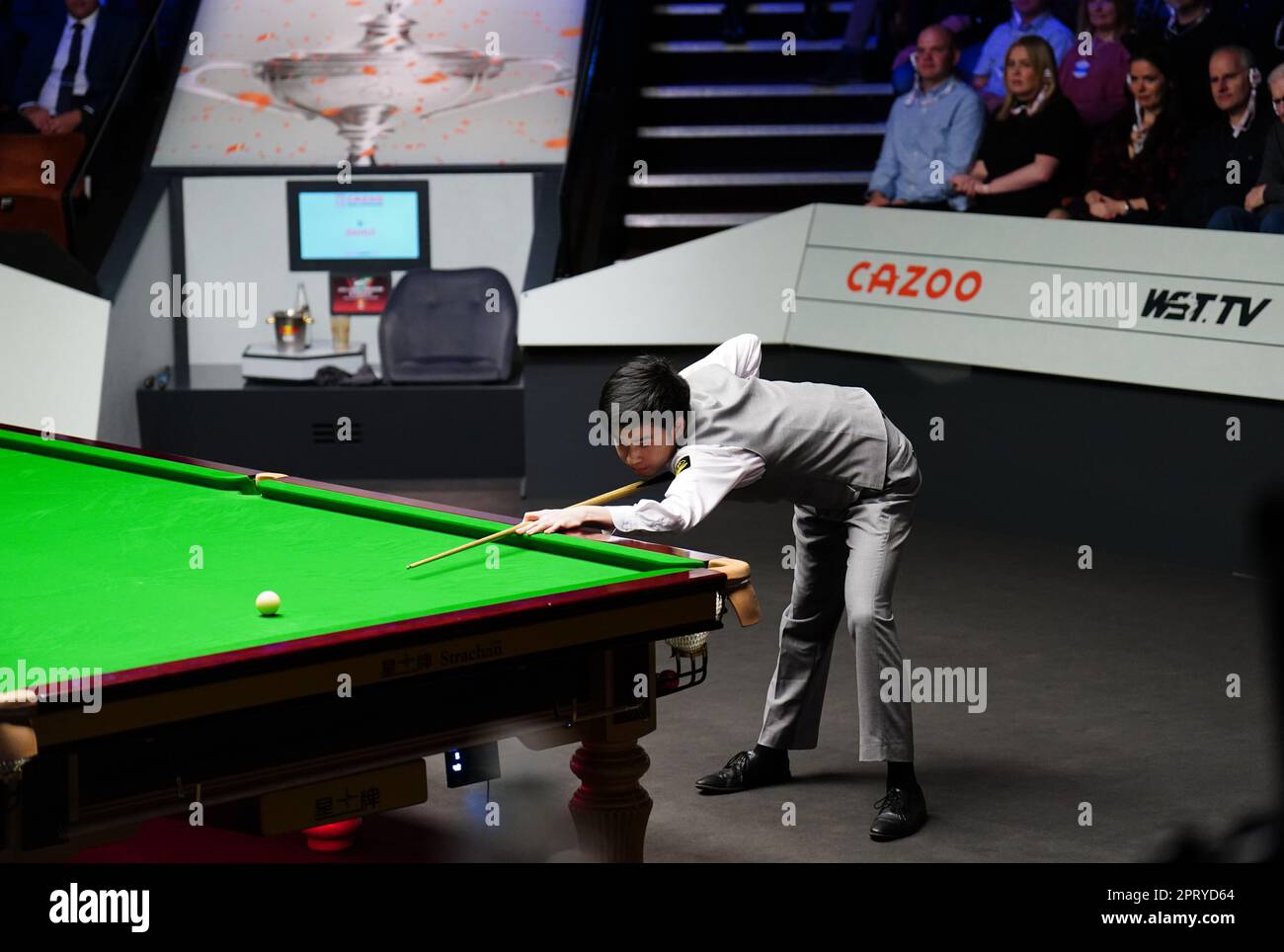Si Jiahui in action against Luca Brecel (not pictured) on day thirteen of the Cazoo World Snooker Championship at the Crucible Theatre, Sheffield