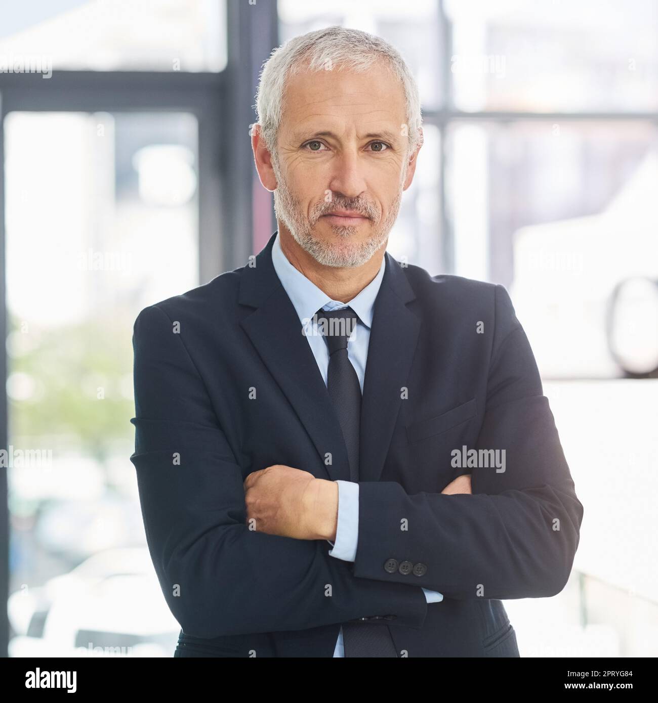 Time to get down to business portrait of a mature executive standing