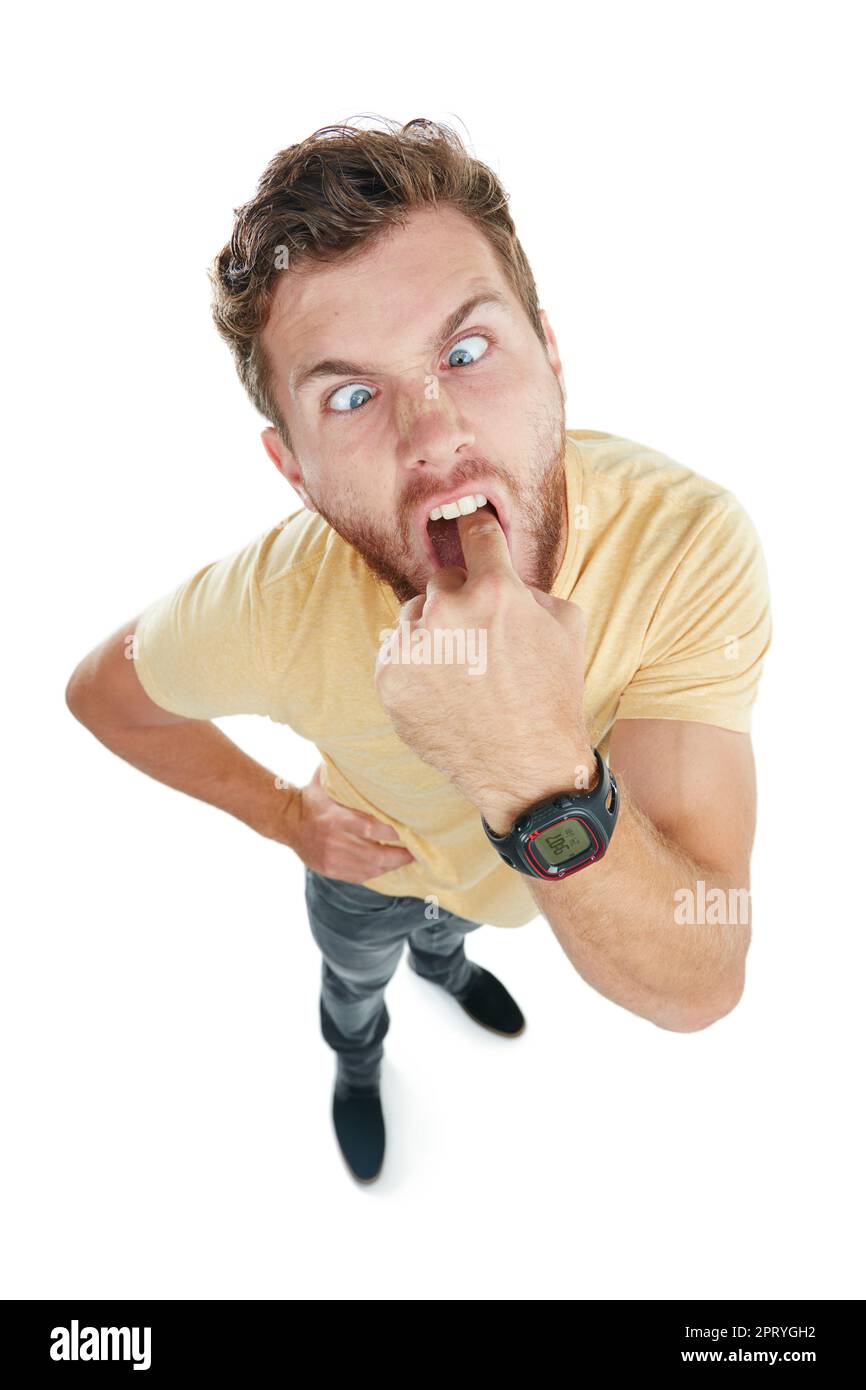 Your attitude makes me sick. Studio portrait of an angry young man