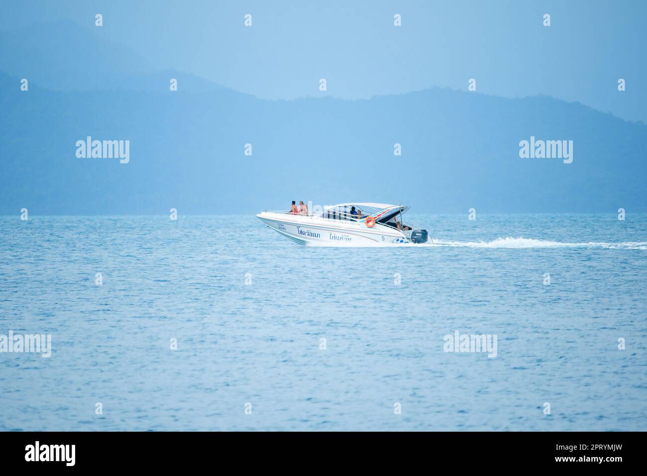 The white speed boat in the sea runs at speed Stock Photo - Alamy