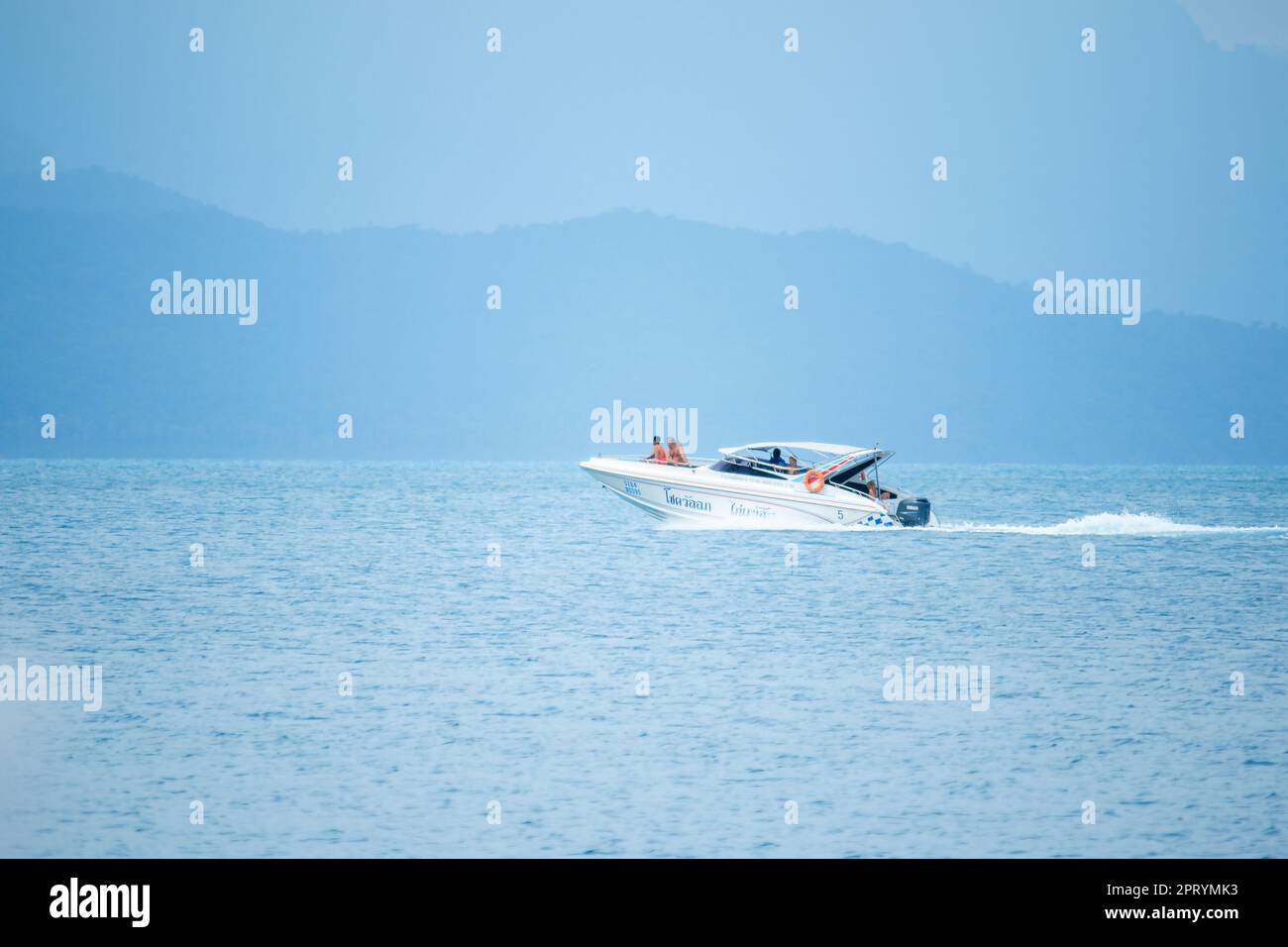The white speed boat in the sea runs at speed Stock Photo - Alamy