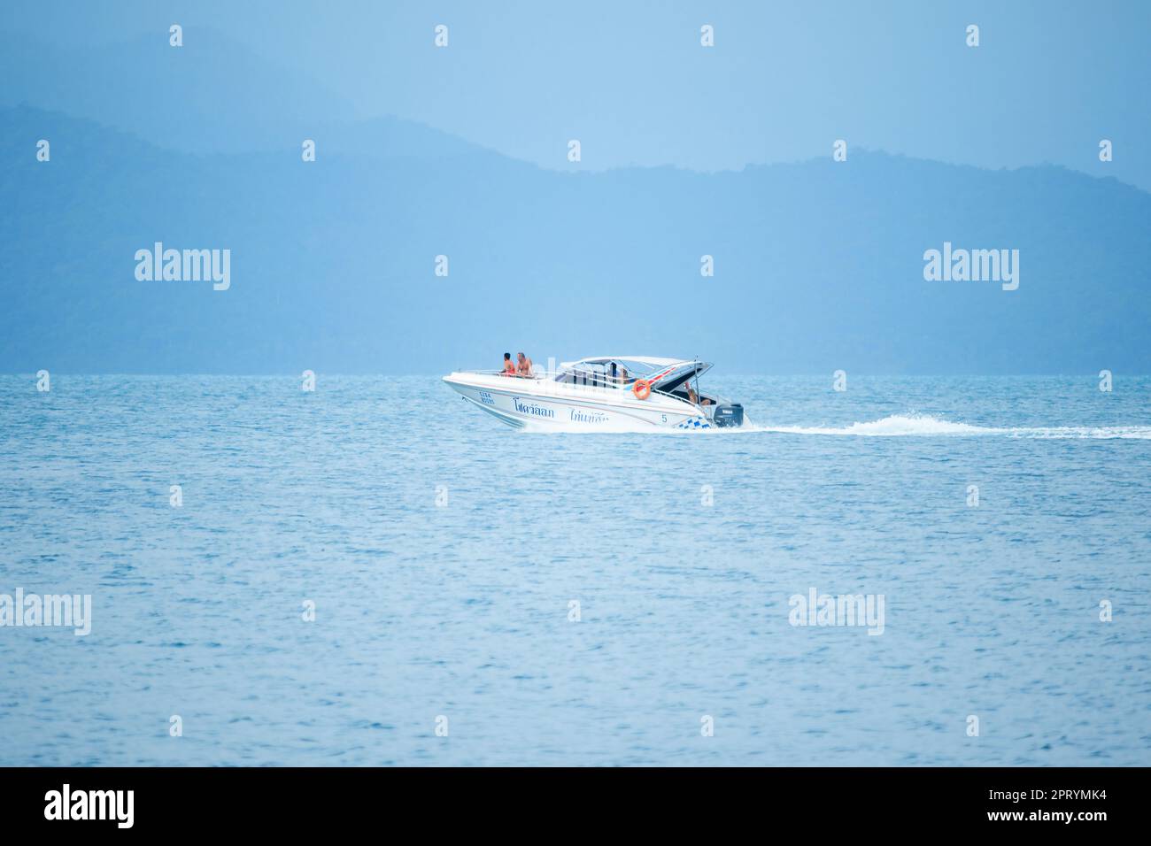 The white speed boat in the sea runs at speed Stock Photo - Alamy