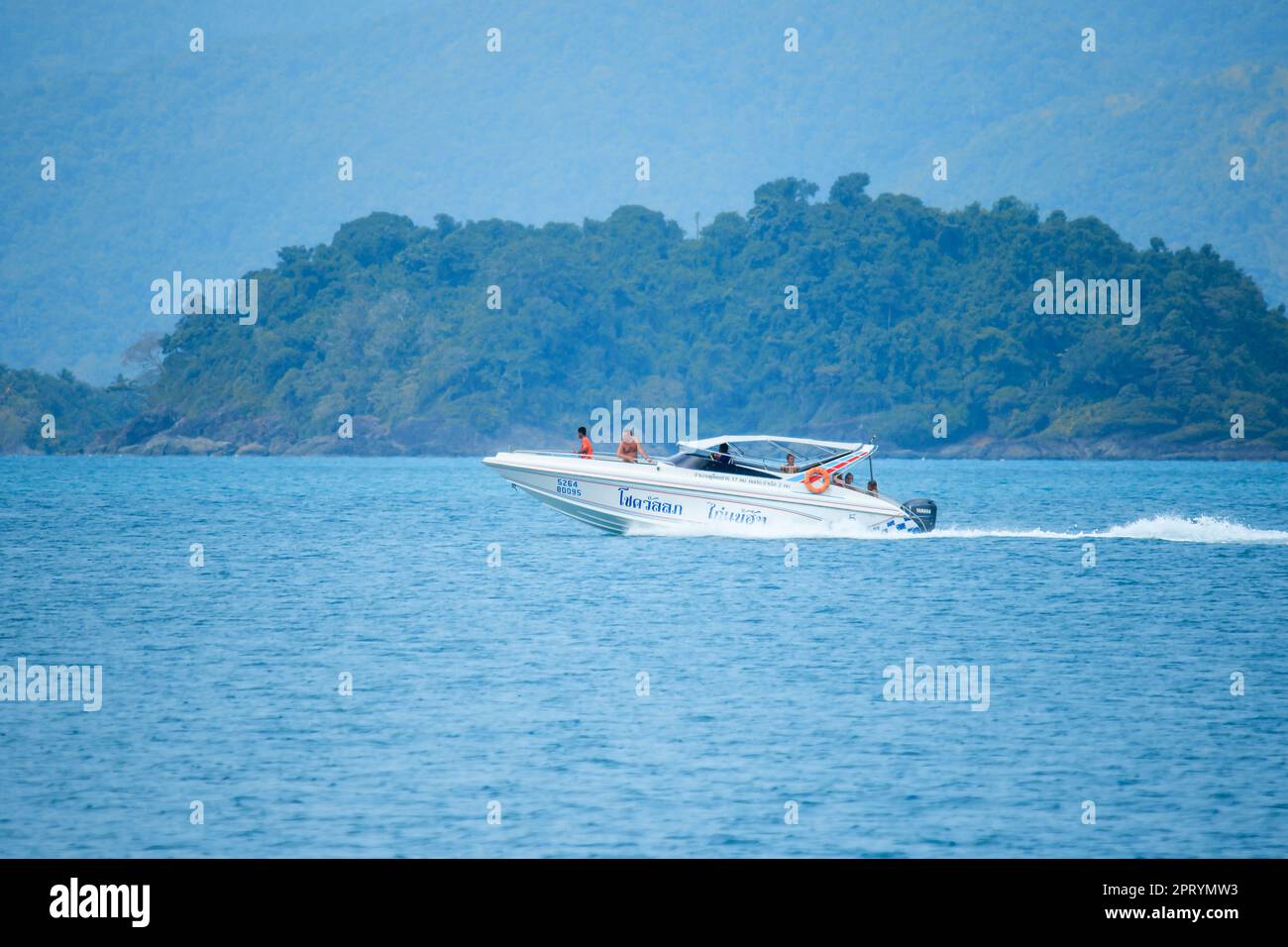 The white speed boat in the sea runs at speed Stock Photo - Alamy