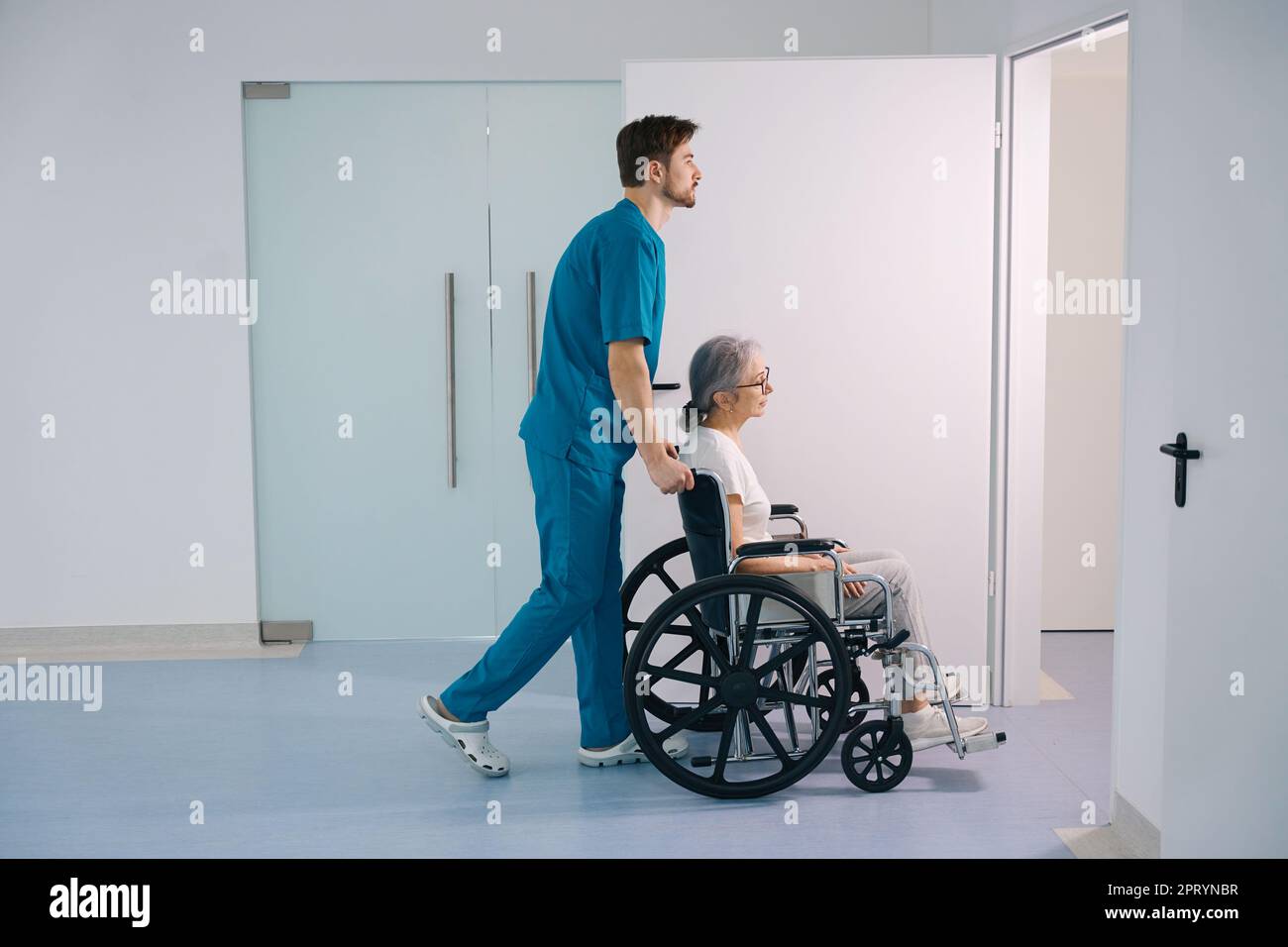 Young care worker elderly hi-res stock photography and images - Alamy