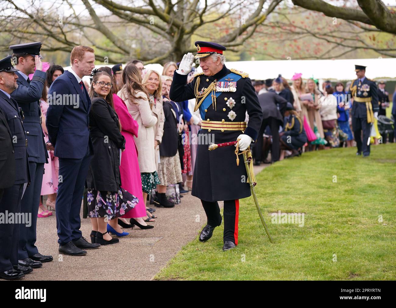 ***DESK - PLEASE SEE OP NOTE FOR GUIDANCE ON NAMES AND PROCEDURE*** King Charles III meeting guests after a ceremony where he presented new Standards and Colours to the Royal Navy; the Life Guards of the Household Cavalry Mounted Regiment; The King???s Company of the Grenadier Guards, and The King???s Colour Squadron of the Royal Air Force, at Buckingham Palace in London. Picture date: Thursday April 27, 2023. Stock Photo