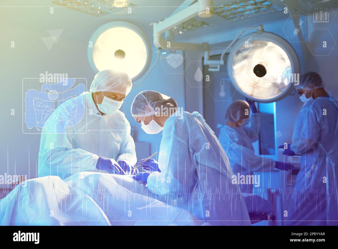 Team of professional doctors performing operation in surgery room and ...