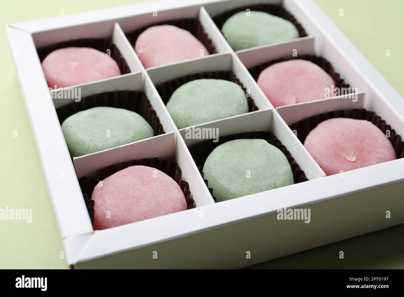 Many different delicious mochi in box on light background, closeup.  Traditional Japanese dessert Stock Photo - Alamy