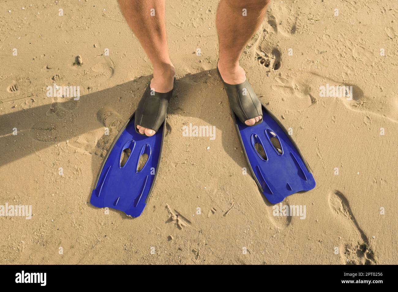 Man wearing swimming flippers hi-res stock photography and images - Alamy