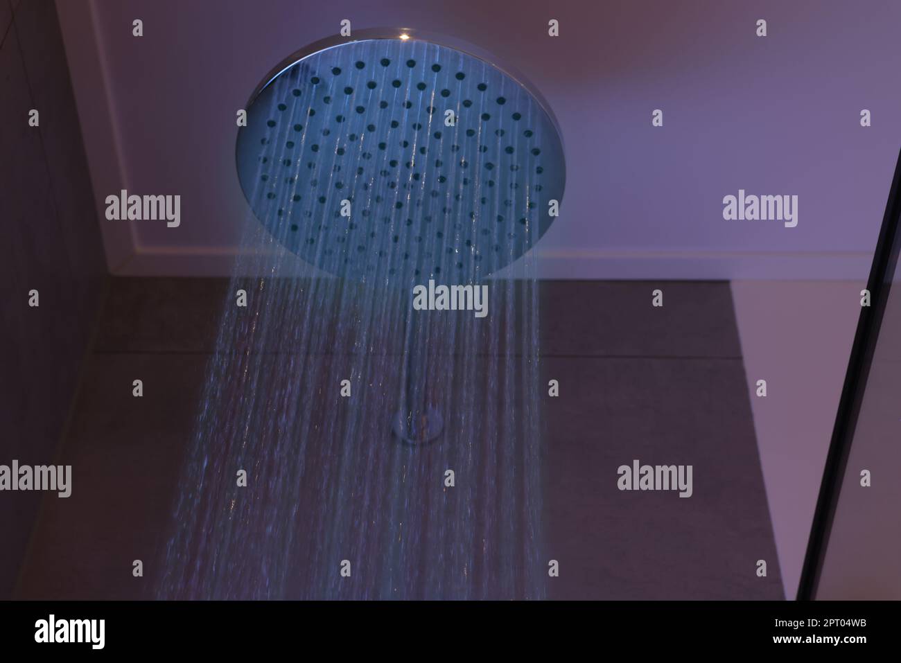 Luxury shower with water flowing in bathroom Stock Photo Alamy