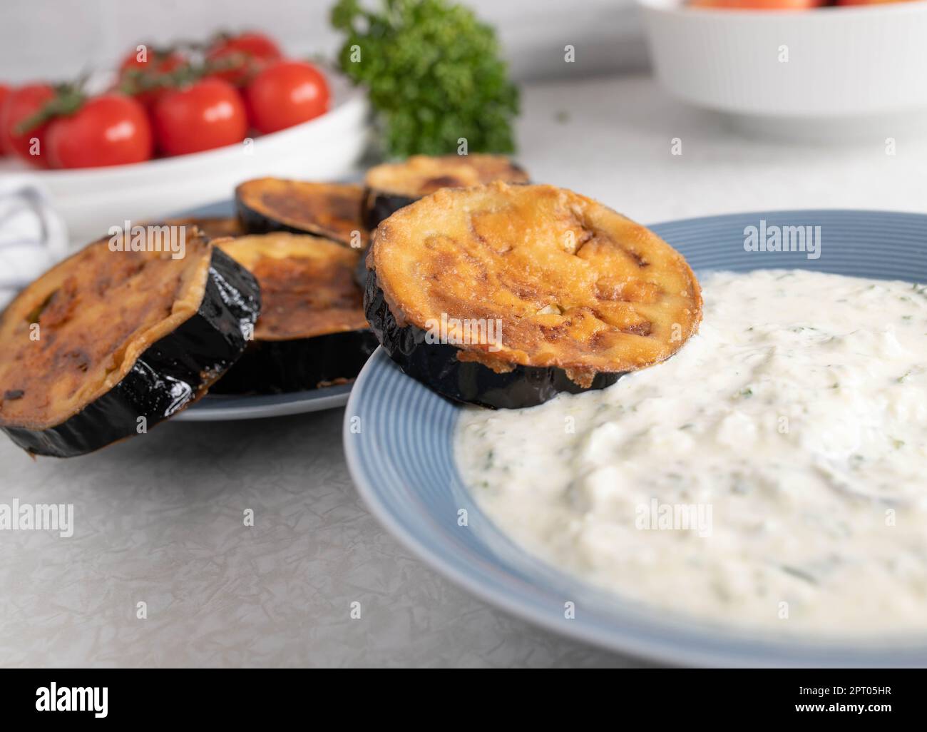 Fried eggplant with greek tzatziki Stock Photo Alamy